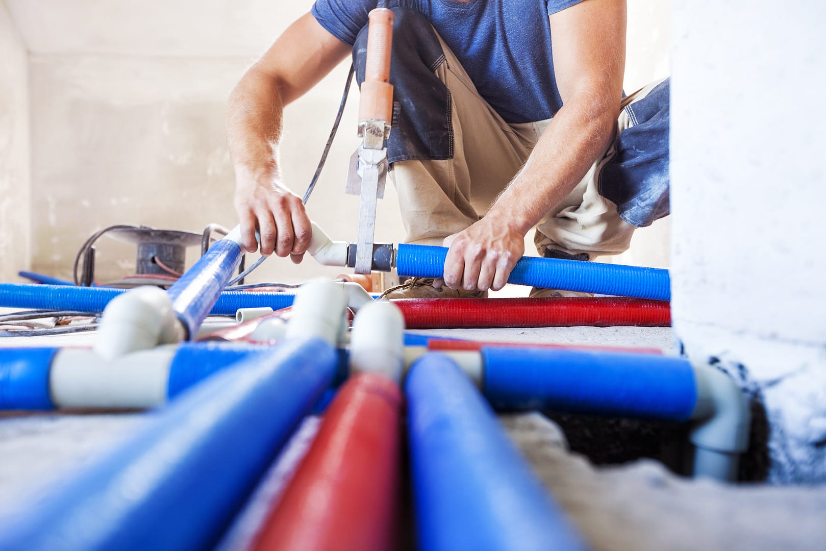 Man repairing pipes